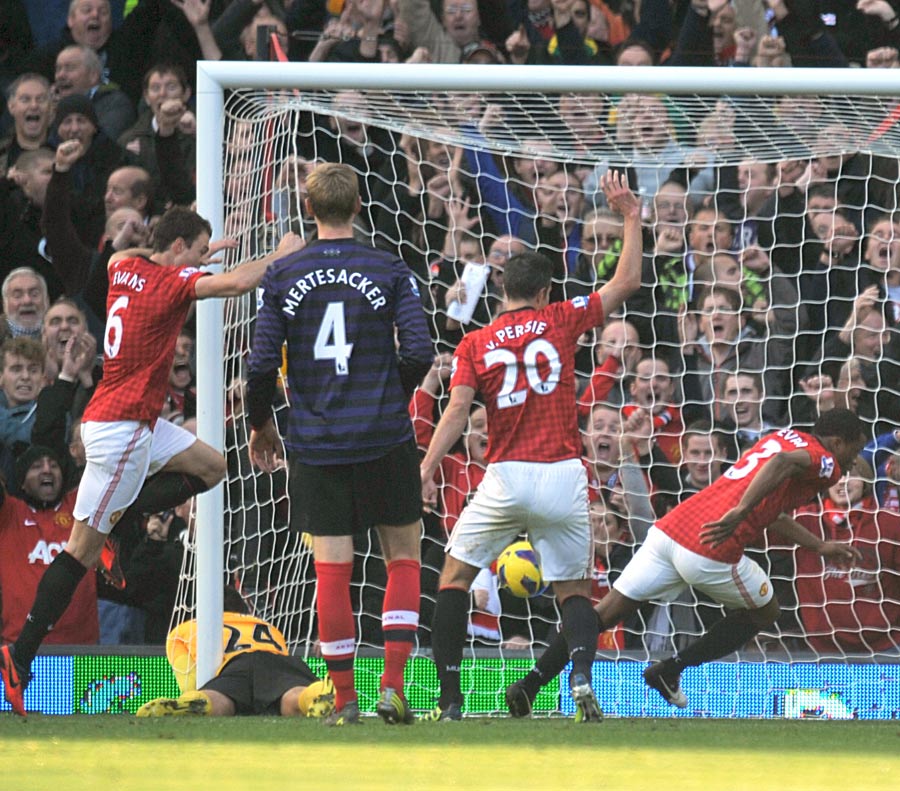 Patrice Evra celebrates scoring the second goal 