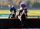 Silviniaco Conti, ridden by Ruby Walsh, clears a fence 