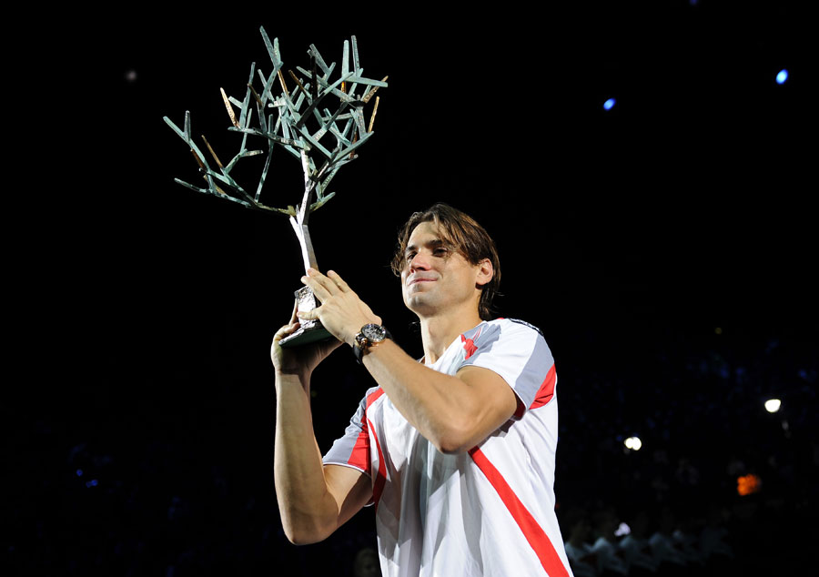 David Ferrer lifts the Paris Masters trophy