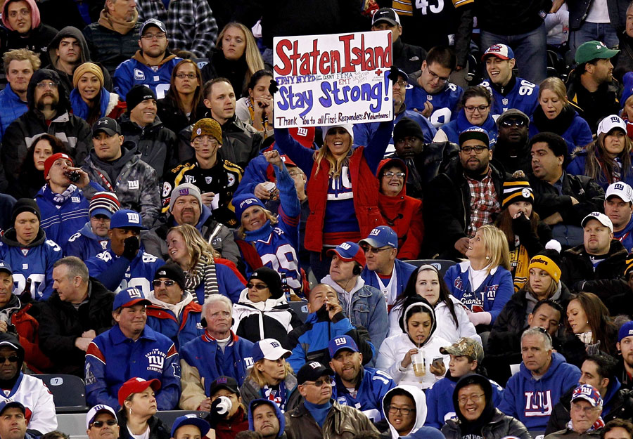 A fan shows support for victims of Superstorm Sandy