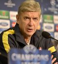 Arsene Wenger talks to the media during a press conference