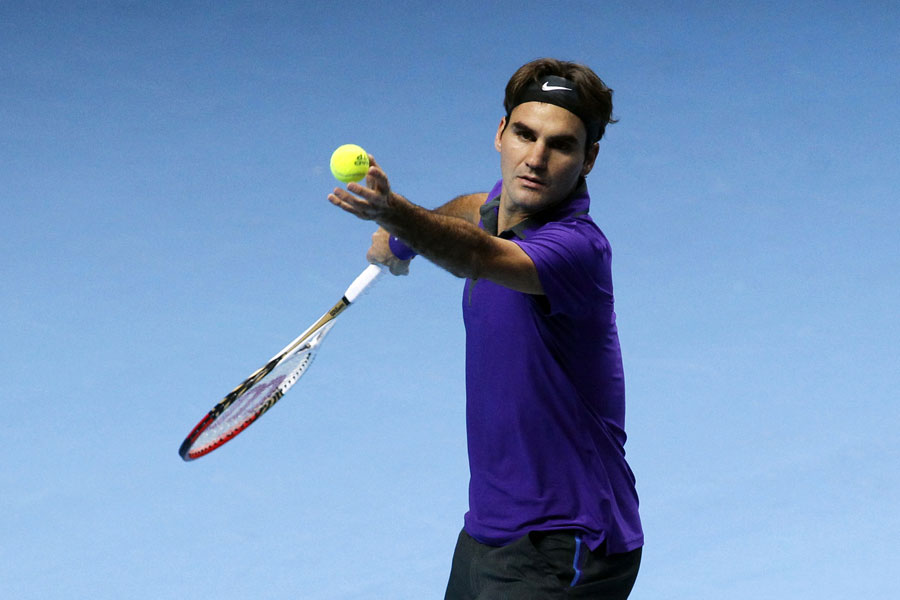 Roger Federer prepares to serve