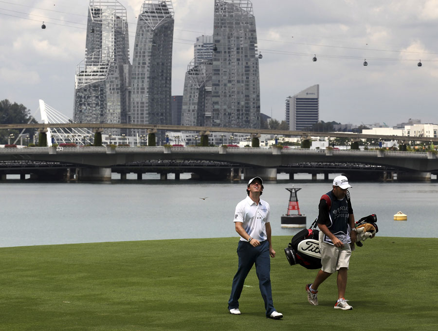 Rory McIlroy looks at the clouds during the second round