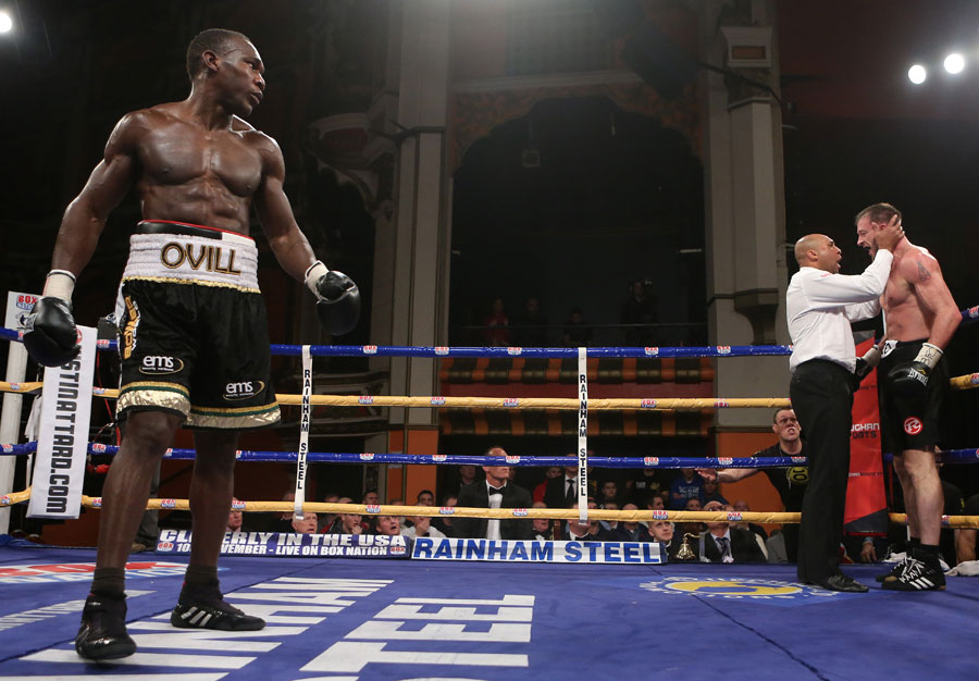 Ovill McKenzie looks on as the referee assesses Enzo Maccarinelli