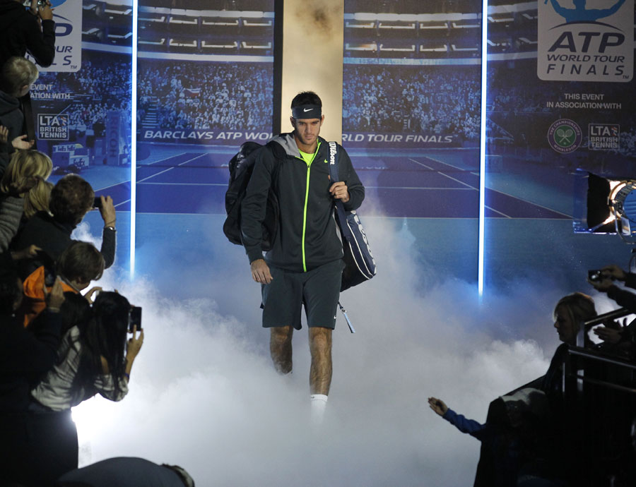 Juan Martin Del Potro arrives at the court to play Novak Djokovic
