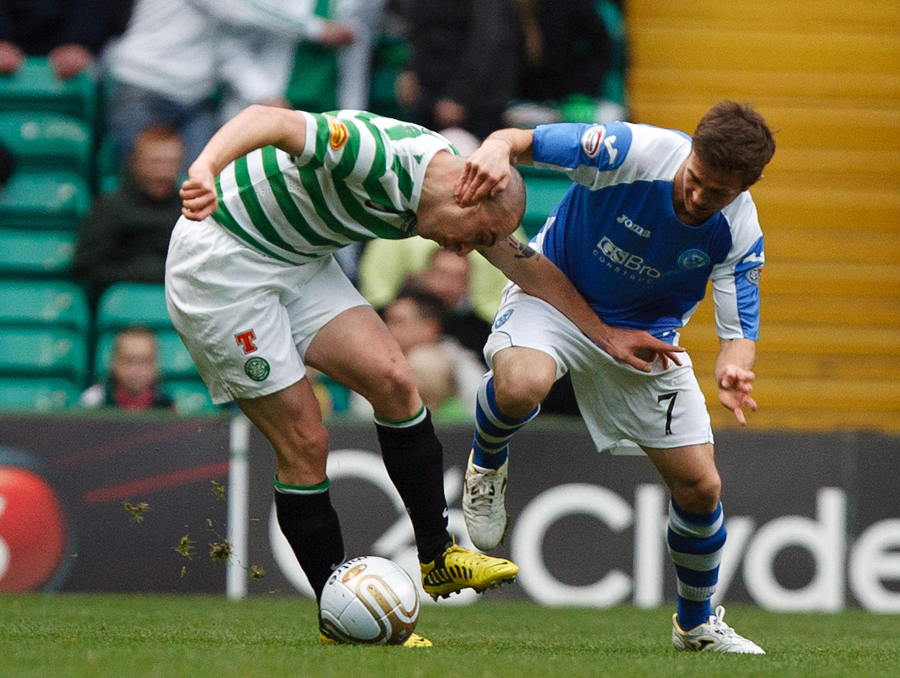 Scott Brown tussles for the ball