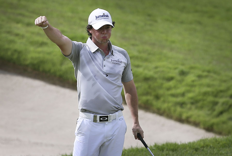 Rory McIlroy celebrates after sinking a putt
