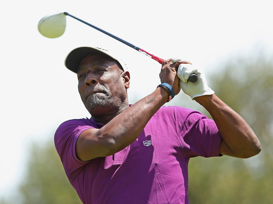 Former West Indies cricketer Viv Richards hits a tee shot