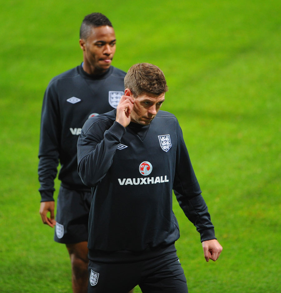 Raheem Sterling and Steven Gerrard take part in training
