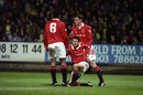 Lee Sharp and Paul Ince celebrate with Ryan Giggs