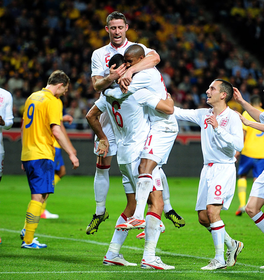 England celebrate Steven Caulker's goal