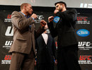 Georges St-Pierre and Carlos Condit face off during the pre-fight press conference