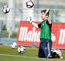 Iker Casillas saves a shot in training