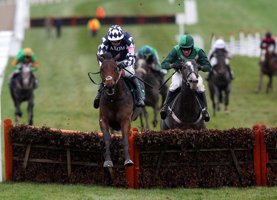 Far West, ridden by Ruby Walsh, jumps the last