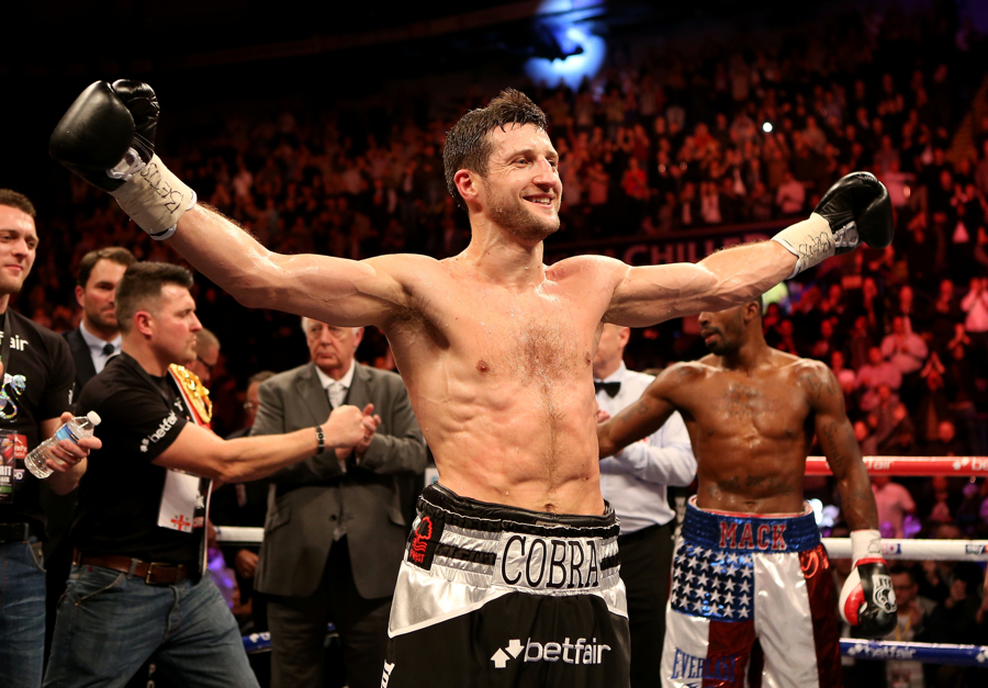 Carl Froch celebrates his victory