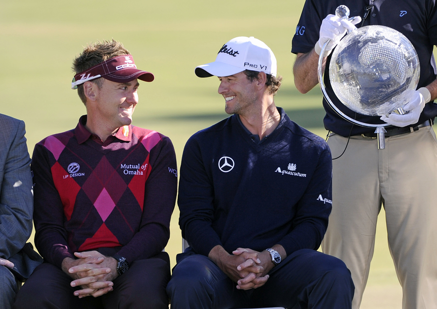 Ian Poulter and Adam Scott grin at each other