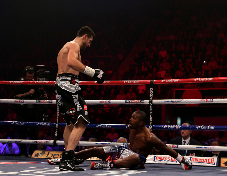 Carl Froch towers over Yusaf Mack