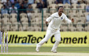 Pragyan Ojha is ecstatic after taking a wicket