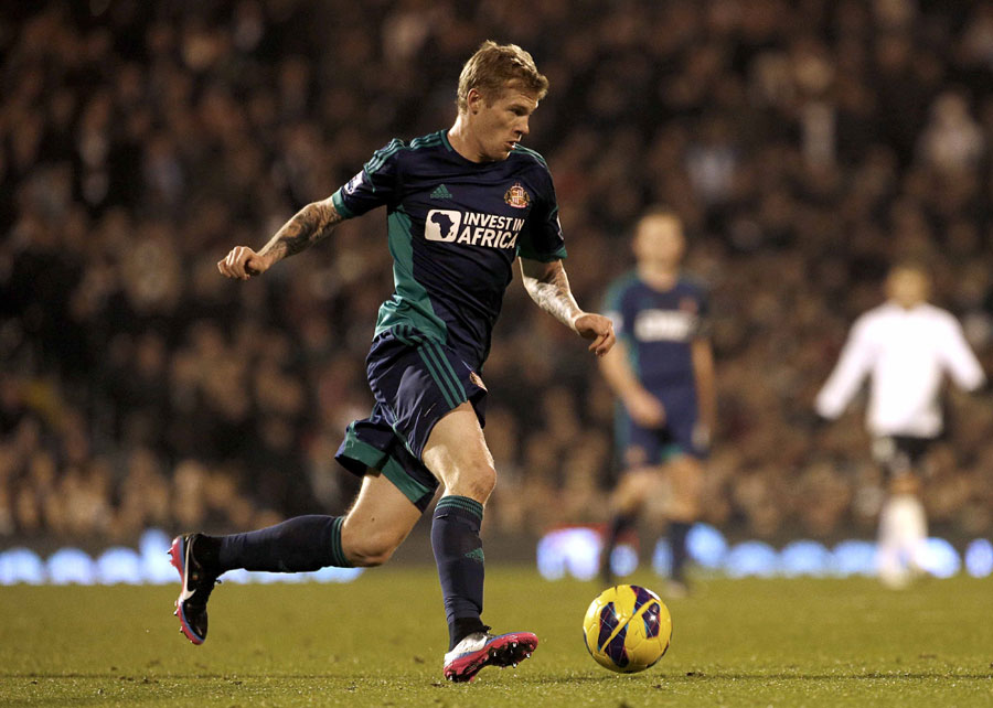 James McClean looks to release the ball