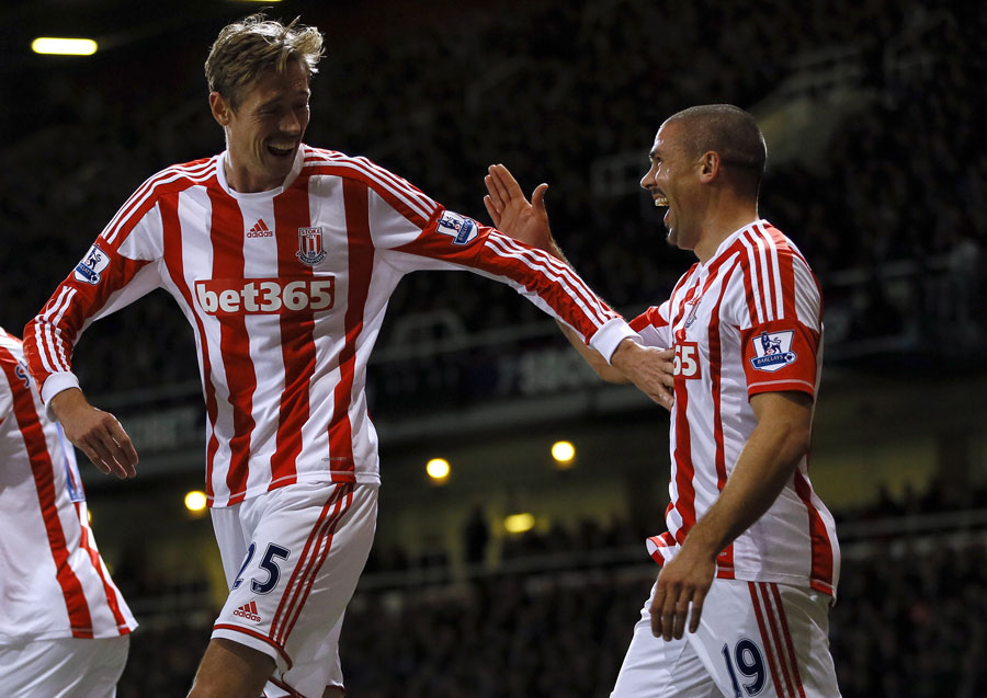 Jon Walters celebrates with Peter Crouch