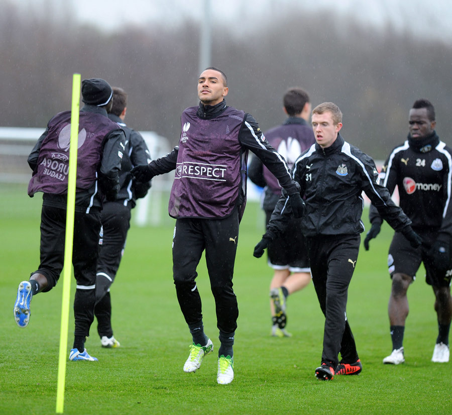 Danny Simpson warms up during Newcastle training