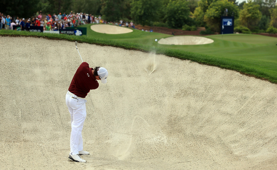 Rory McIlroy tries to escape a bunker