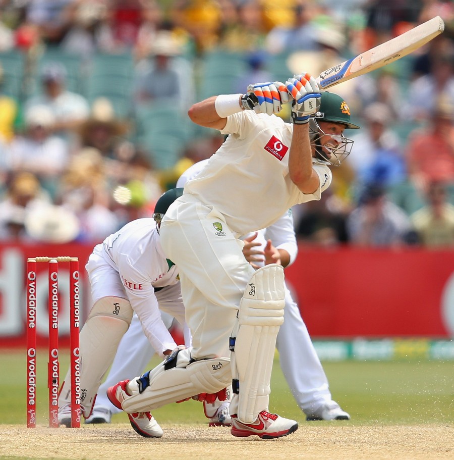 Michael Hussey drives down the ground
