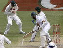 Michael Clarke juggles a ball before catching out South Africa's Hashim Amla