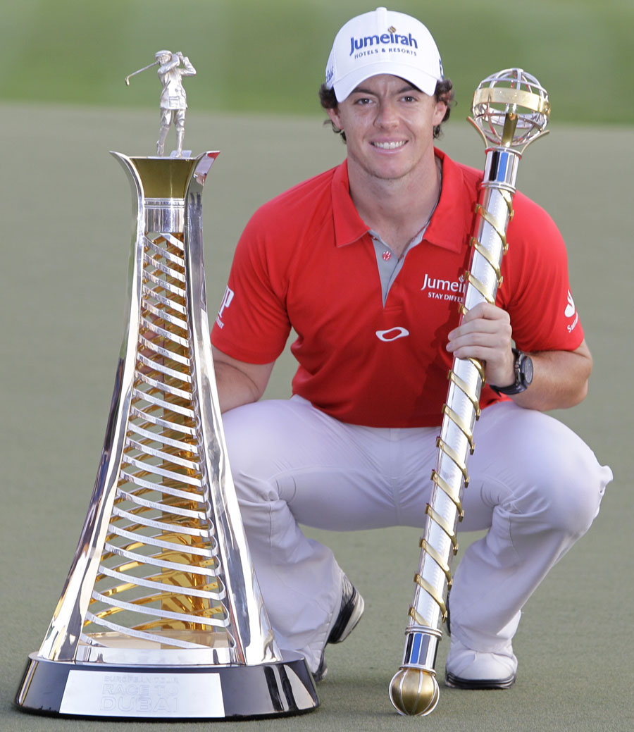 Rory McIlroy holds the trophy after winning in the final round