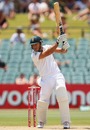 Faf du Plessis works the ball through the off side