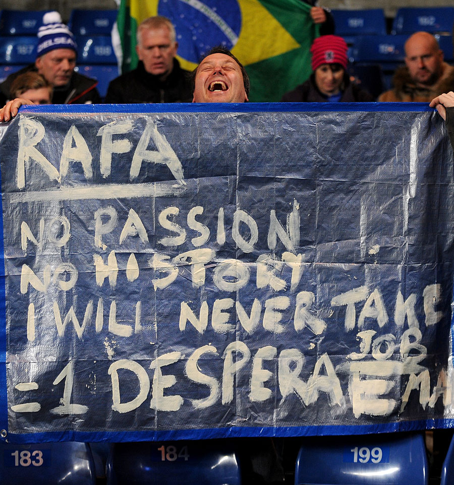 A Chelsea fan shows his disgust at the appointment of Rafael Benitez