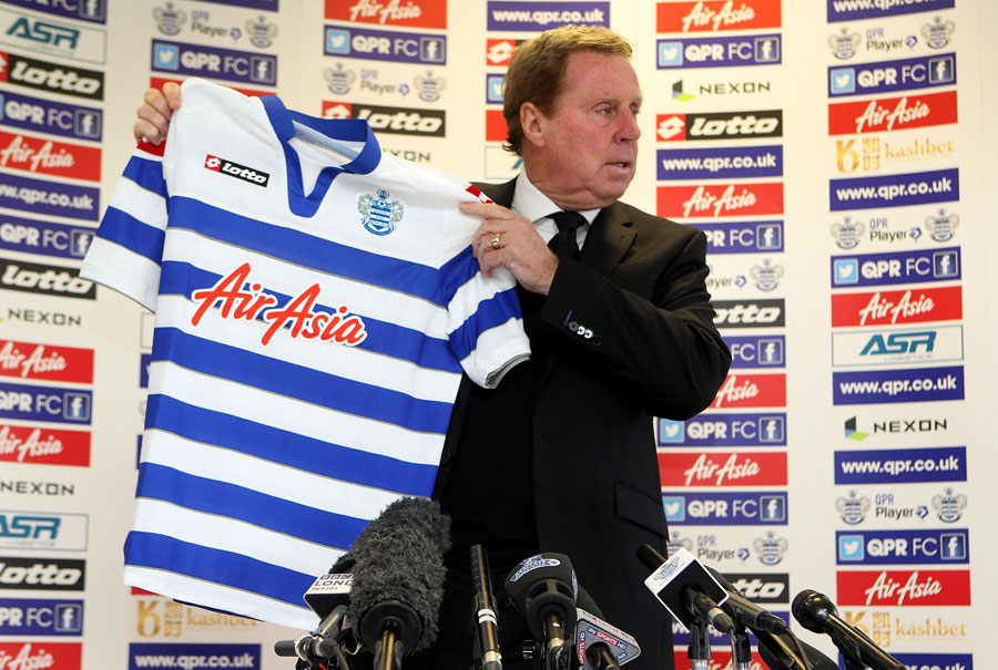 Harry Redknapp poses with the QPR shirt