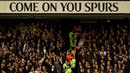 Police separate Tottenham and West Ham fans during the match