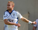 Stuart Broad warms up in a training session