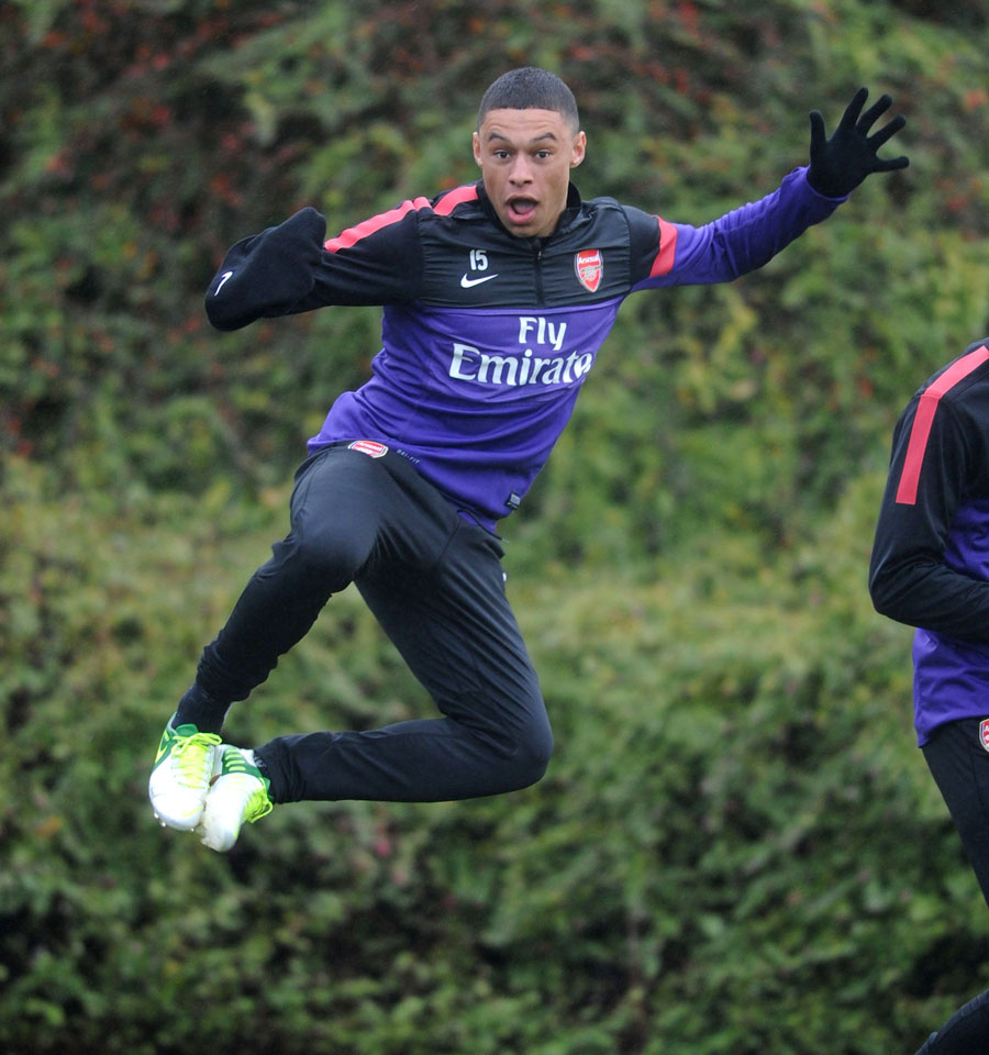 Alex Oxlade-Chamberlain enjoys himself during a training session