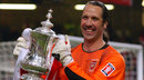David Seaman celebrates with the FA Cup Trophy