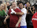 Manny Pacquiao hugs coach Freddie Roach
