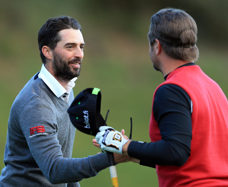 John Parry is congratulated by his playing partner