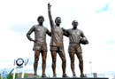 The United Trinity statue of former players, (from left to right) George Best, Denis Law and Bobby Charlton 