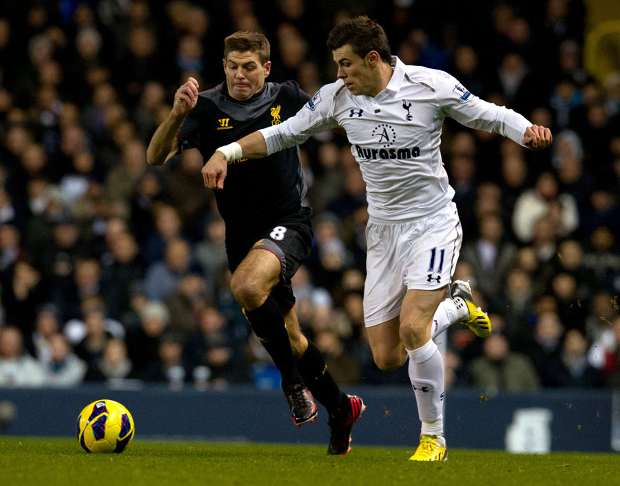 Gareth Bale slips past Steven Gerrard
