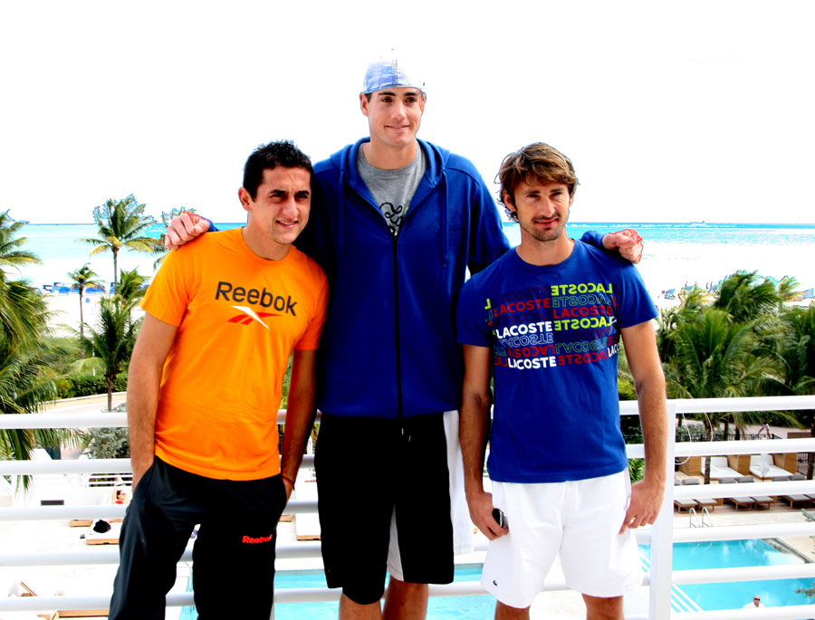 Nicolas Almagro, John Isner, and Juan Carlos Ferrero pose for photos
