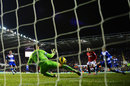 Wayne Rooney scores his second goal of the game