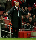 Arsene Wenger stands frustrated on the touchline