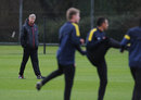 Arsene Wenger keeps an eye on training