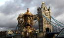 The Webb Ellis Cup sits in front of Tower Bridge
