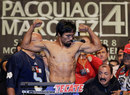 Manny Pacquiao poses at the weigh-in