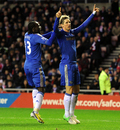 Fernando Torres celebrates with Victor Moses