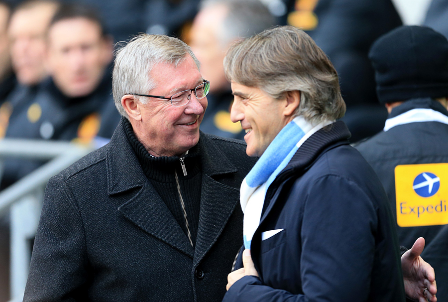 Sir Alex Ferguson and Roberto Mancini share a word before kick-off