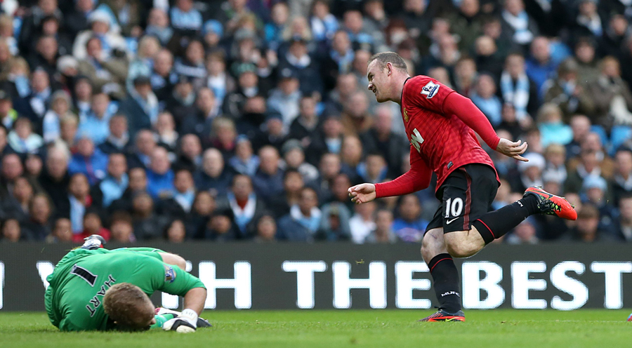 Wayne Rooney wheels away after scoring his second