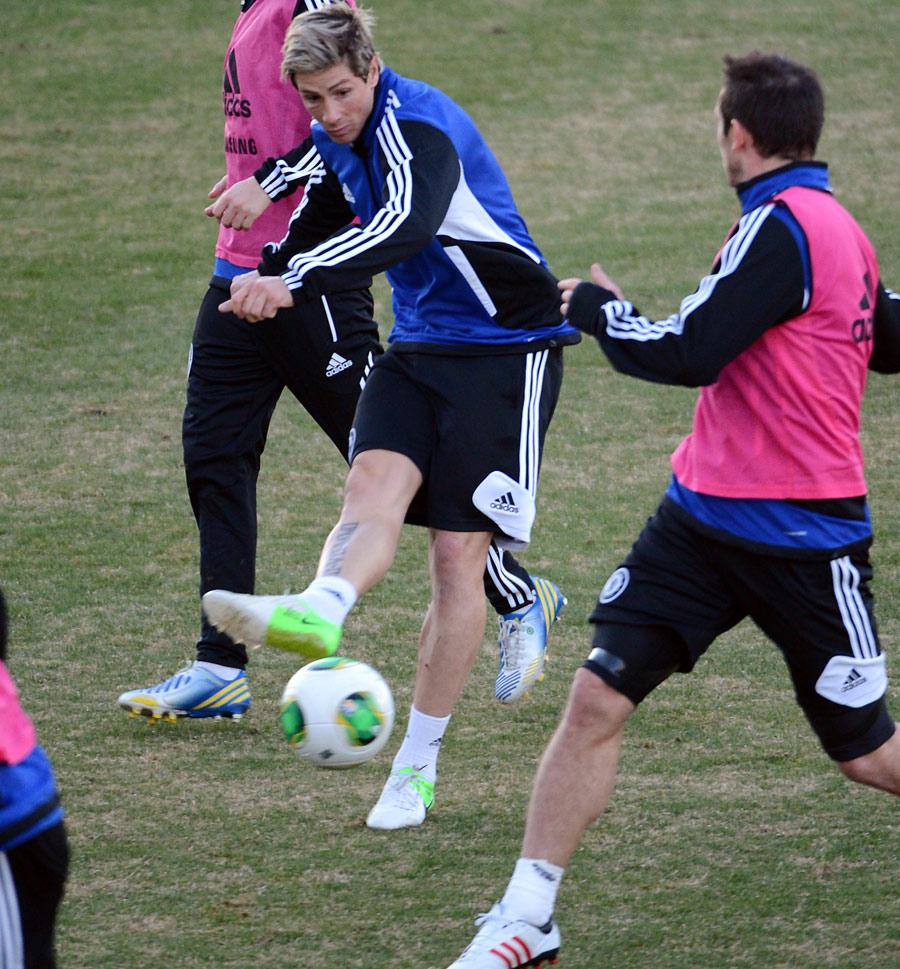Fernando Torres hits a shot in training